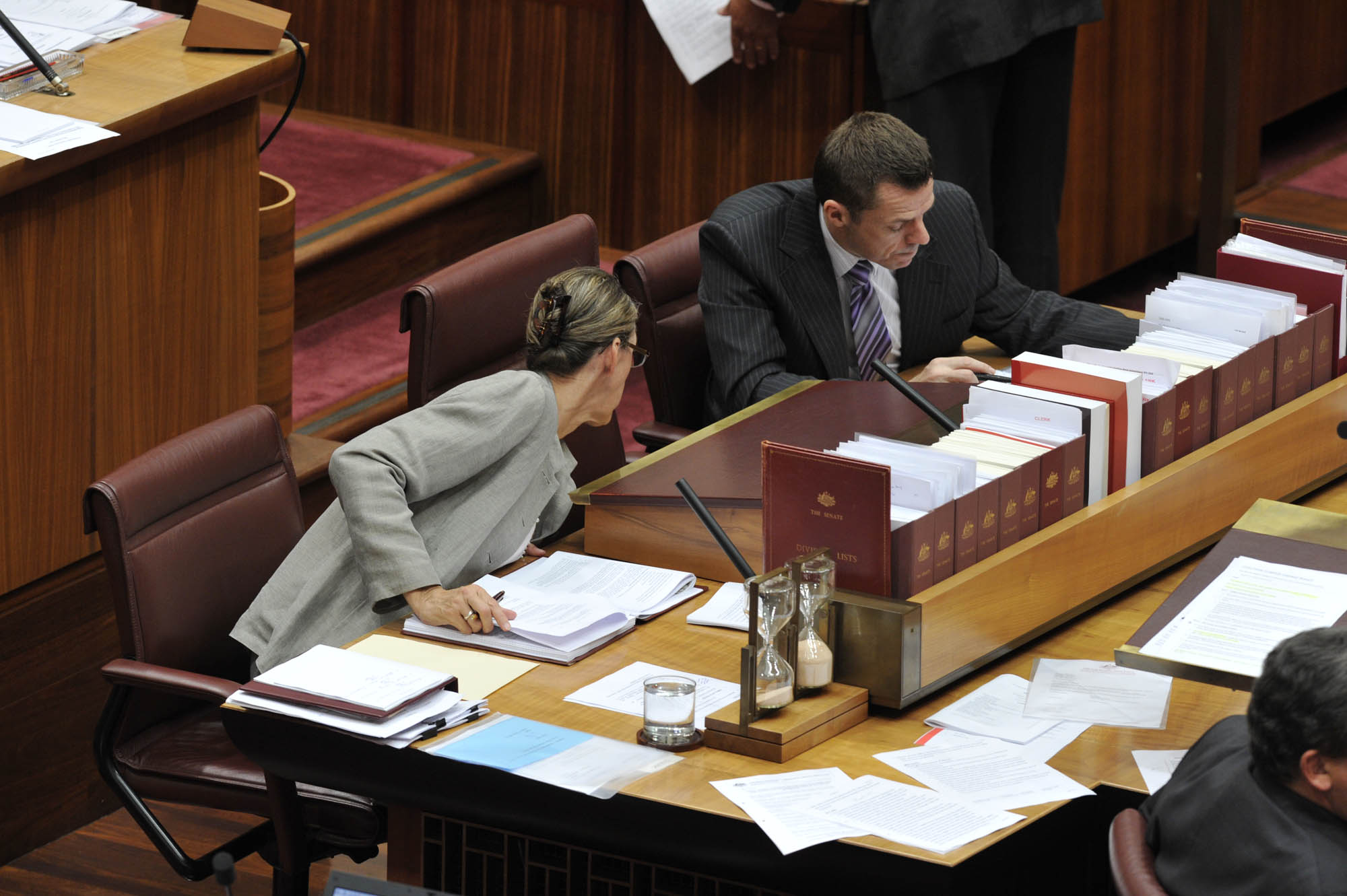 The Clerk and Deputy Clerk in the Senate chamber